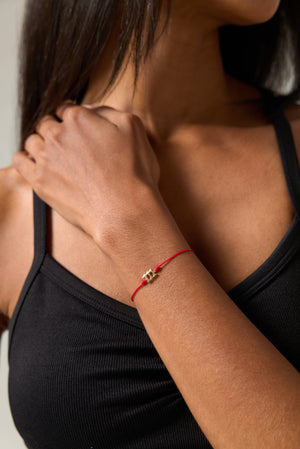 111 Red String Bolo Bracelet
