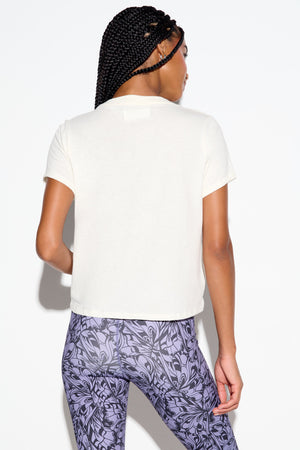 222 Optimist Lila Tee