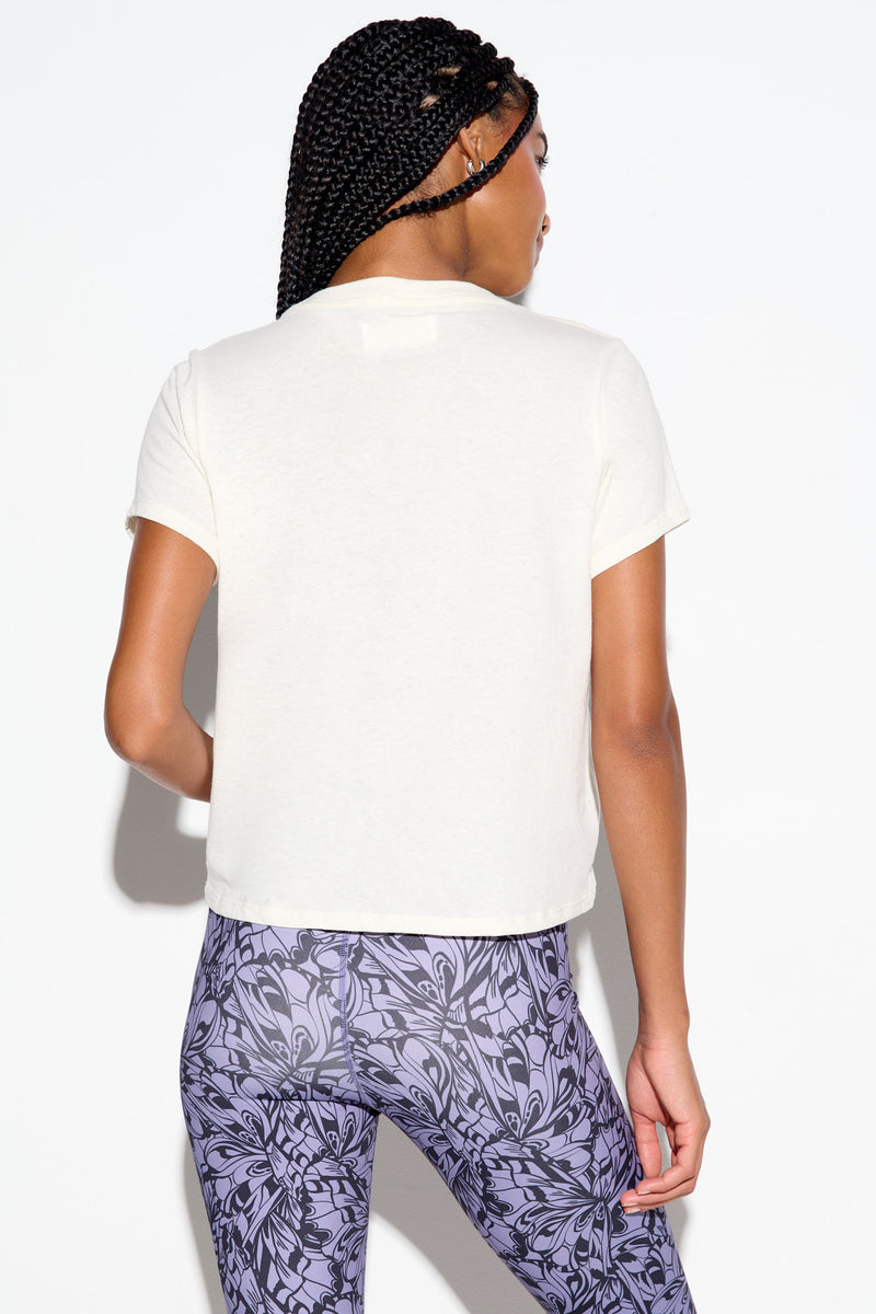 222 Optimist Lila Tee